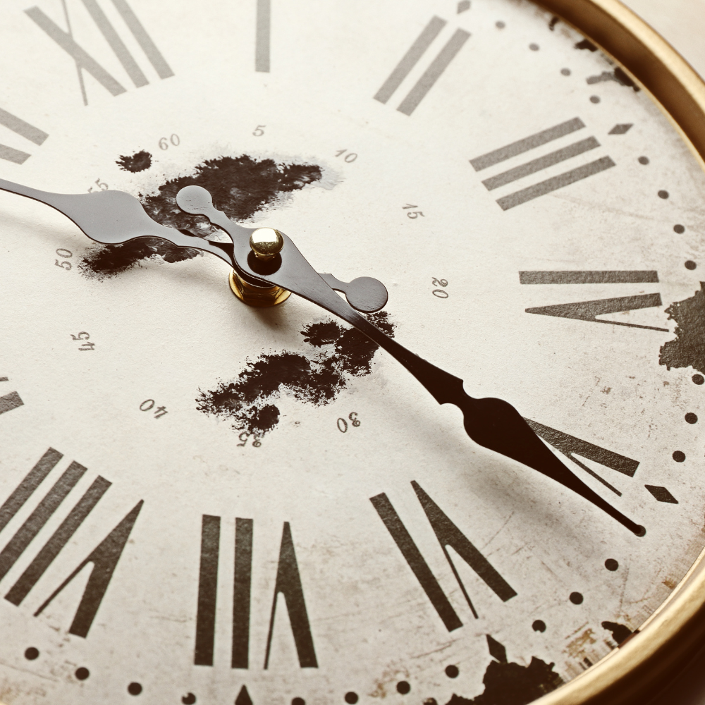 Vintage clock with broken glass, reflecting time, stress, and life pressures